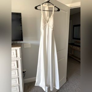 Wedding dress worn once for a couple hours